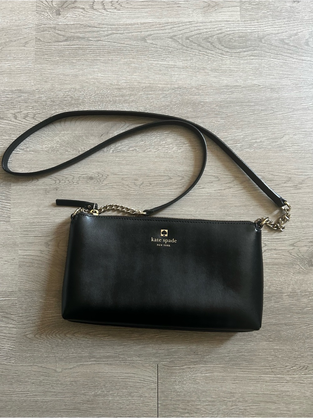 Kate Spade New York Sawyer Street Declan black leather crossbody bag.